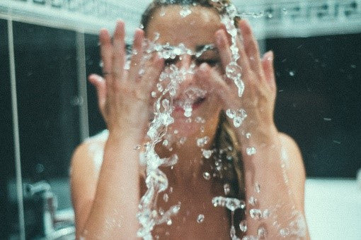Woman Splashing Water On Face - Vu Skin System